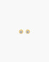 Pair of gold earrings with clear stones on a white background